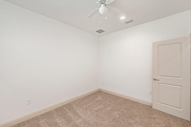 76 Azalea Dr, Freeport, FL 32439 - empty room featuring light carpet, ceiling fan, and baseboards