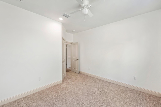 76 Azalea Dr, Freeport, FL 32439 - empty room with light colored carpet, a ceiling fan, baseboards, and recessed lighting