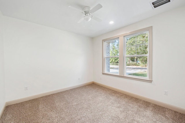 76 Azalea Dr, Freeport, FL 32439 - spare room featuring light carpet, baseboards, a ceiling fan, and recessed lighting