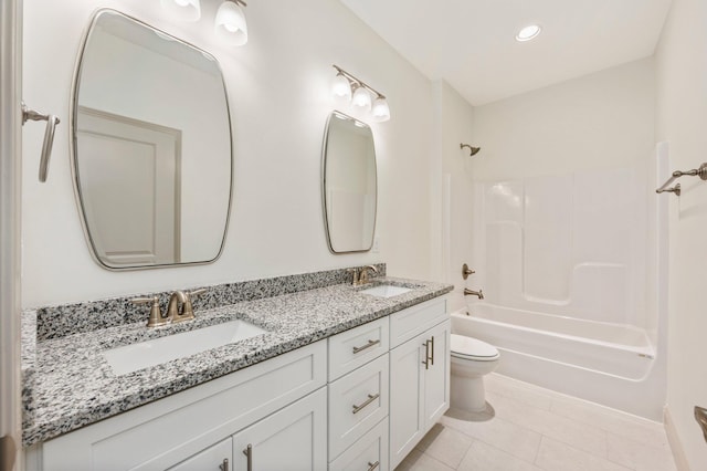 76 Azalea Dr, Freeport, FL 32439 - full bath featuring toilet,  shower combination, tile patterned floors, double vanity, and recessed lighting