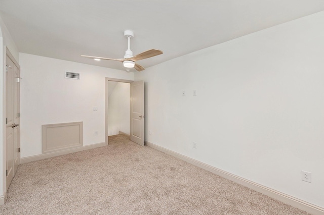 76 Azalea Dr, Freeport, FL 32439 - unfurnished bedroom featuring light colored carpet, baseboards, and a ceiling fan