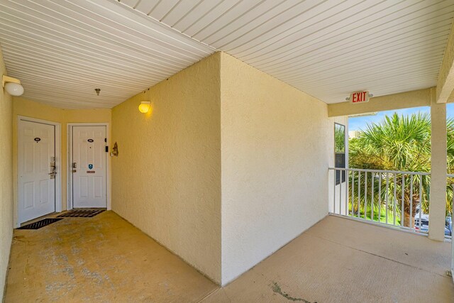 doorway to property featuring a balcony