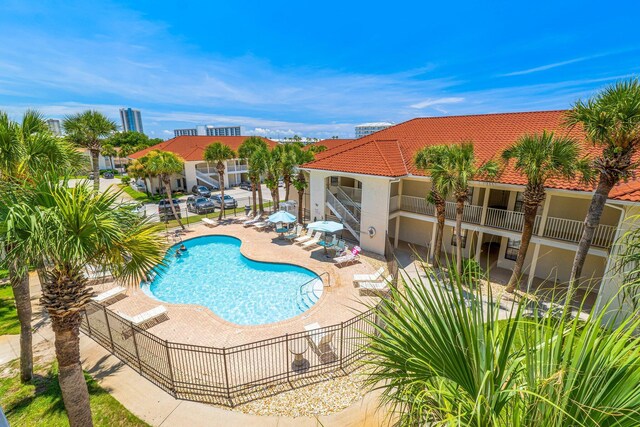 view of swimming pool featuring a patio area