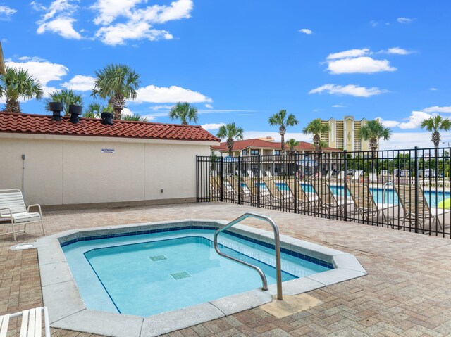 view of swimming pool with a patio area