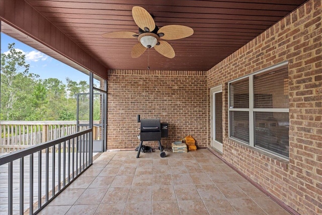 exterior space with ceiling fan