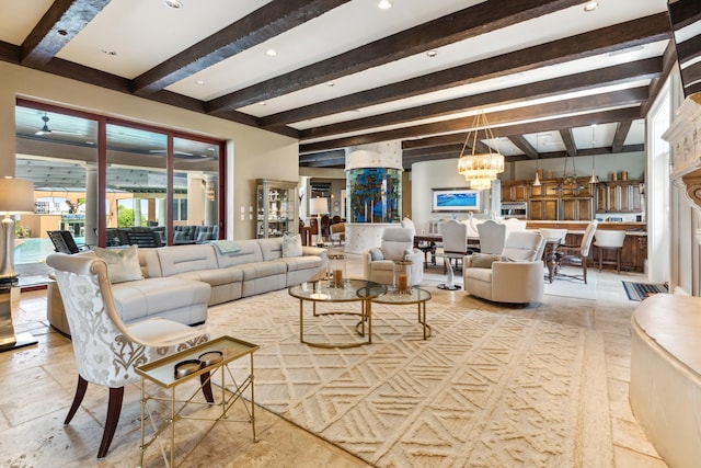 tiled living room featuring an inviting chandelier and beamed ceiling