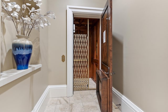 hallway with baseboards