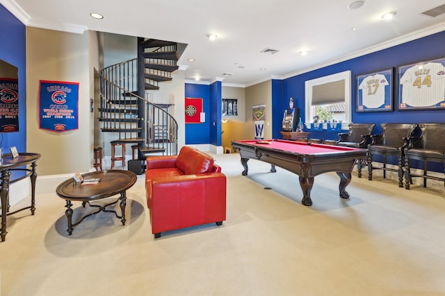 rec room with billiards, ornamental molding, and light colored carpet