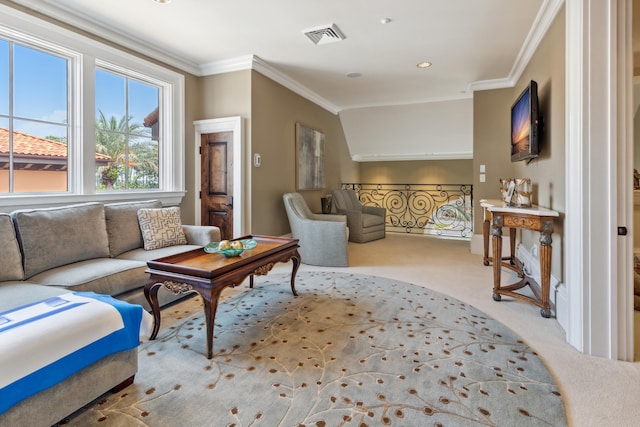 living area featuring ornamental molding, carpet, and visible vents