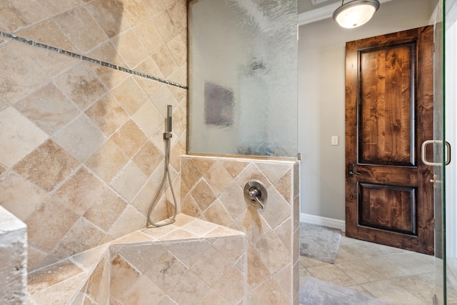 bathroom featuring tile patterned flooring and a shower with shower door