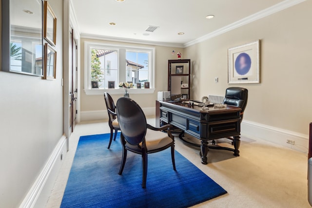 office space with baseboards, ornamental molding, visible vents, and carpet
