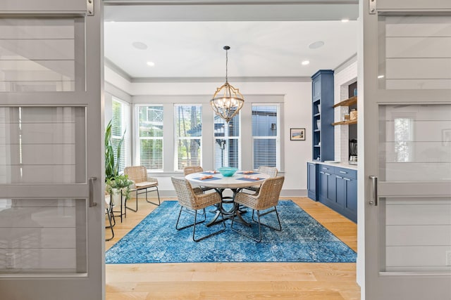 121 Shannon Dr, Santa Rosa Beach, FL 32459 - dining space featuring a barn door, baseboards, light wood-type flooring, a chandelier, and recessed lighting