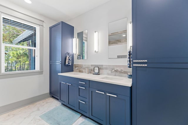 121 Shannon Dr, Santa Rosa Beach, FL 32459 - full bathroom with tasteful backsplash, marble finish floor, a sink, and double vanity