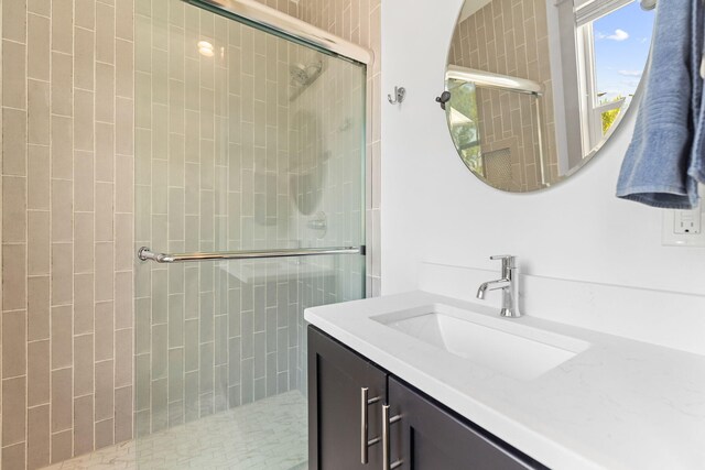 121 Shannon Dr, Santa Rosa Beach, FL 32459 - bathroom with a tile shower and vanity