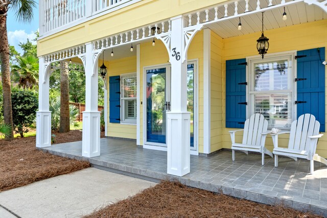 doorway to property featuring a porch