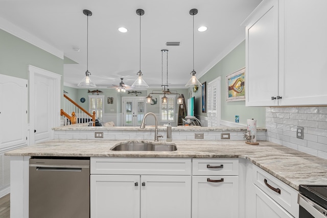 kitchen featuring pendant lighting, white cabinets, dishwasher, ceiling fan, and sink