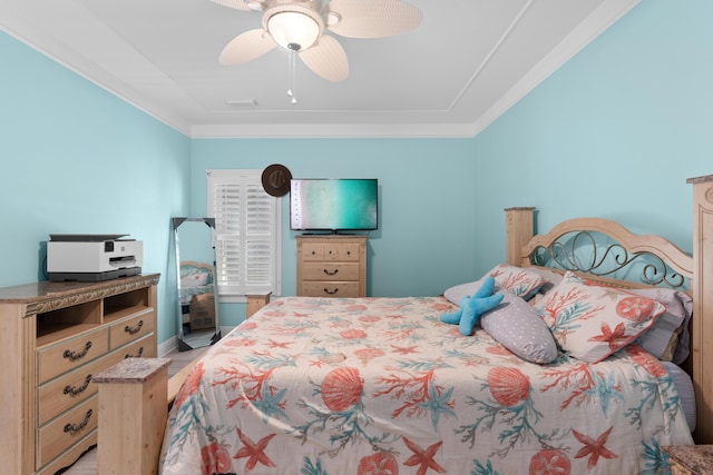 bedroom featuring ornamental molding and ceiling fan