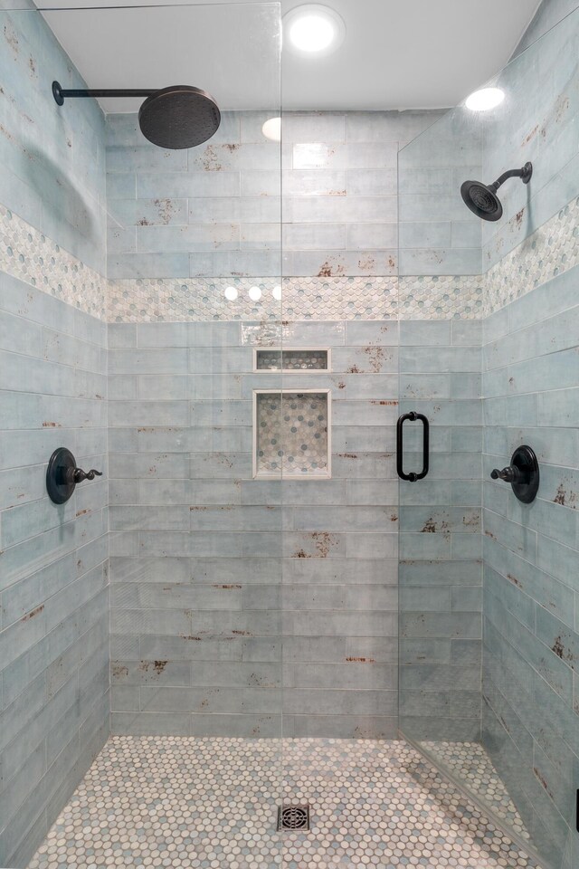 bathroom with an enclosed shower