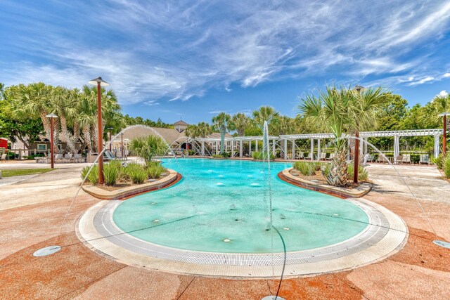 view of pool featuring pool water feature