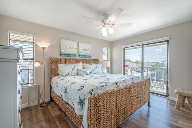 bedroom with dark hardwood / wood-style flooring, access to exterior, and ceiling fan