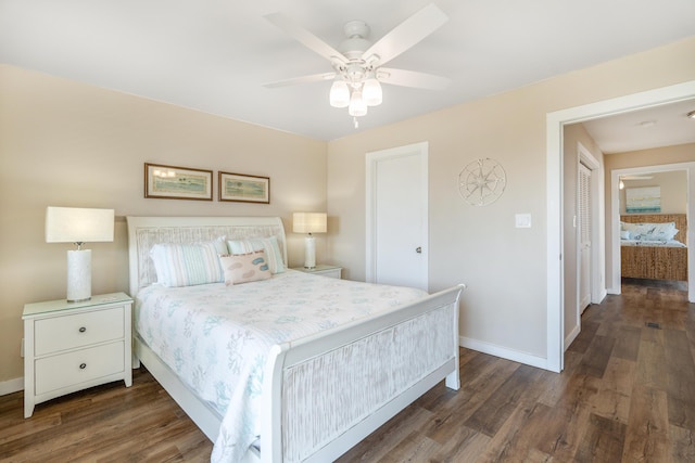 bedroom with dark wood-type flooring and ceiling fan