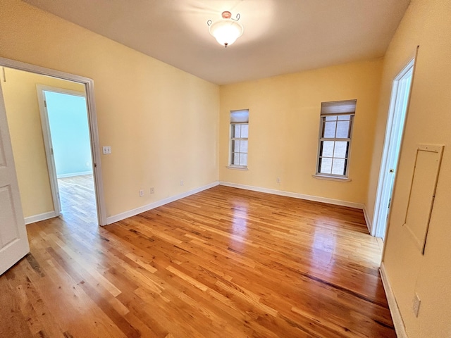 empty room with light wood-type flooring