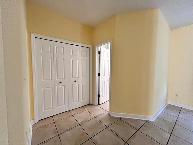 interior space featuring light tile patterned flooring