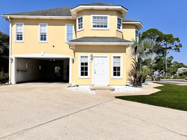 view of front of house with a garage