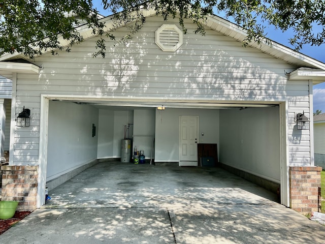 view of side of property featuring electric water heater