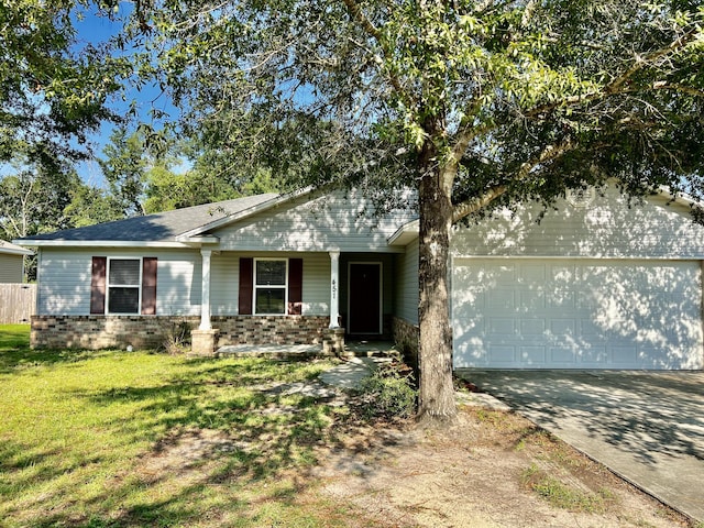 single story home with a garage and a front lawn