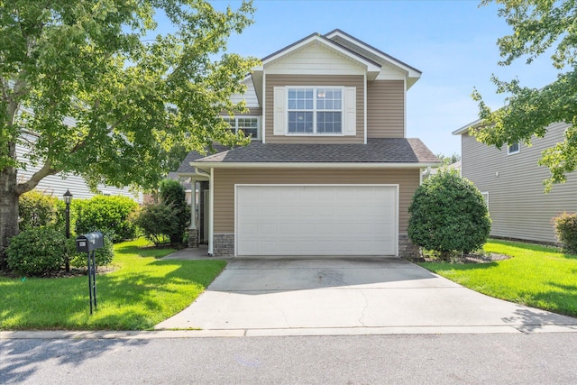 craftsman house featuring a garage and a front yard