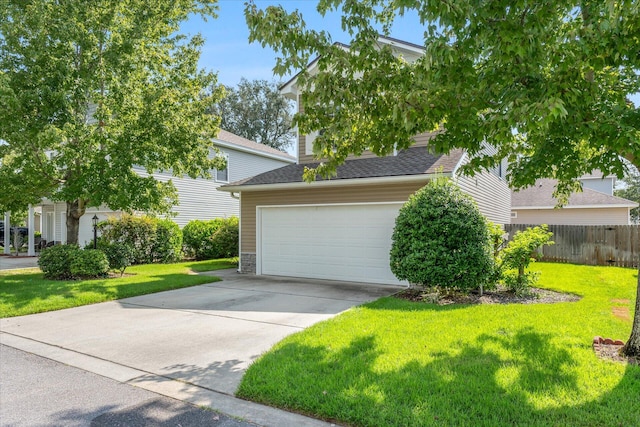 exterior space with a front lawn and a garage