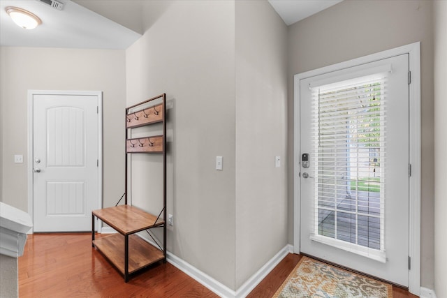 doorway to outside featuring hardwood / wood-style flooring