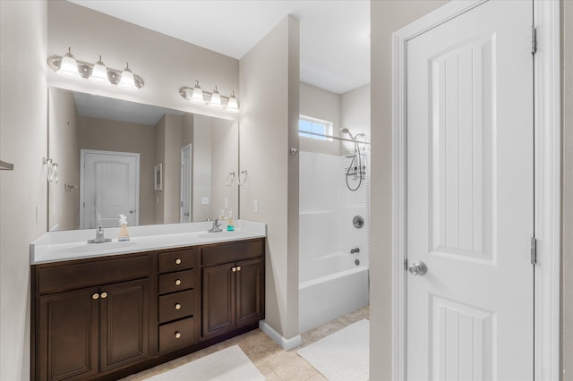 bathroom featuring double sink vanity, shower / tub combination, and tile patterned floors