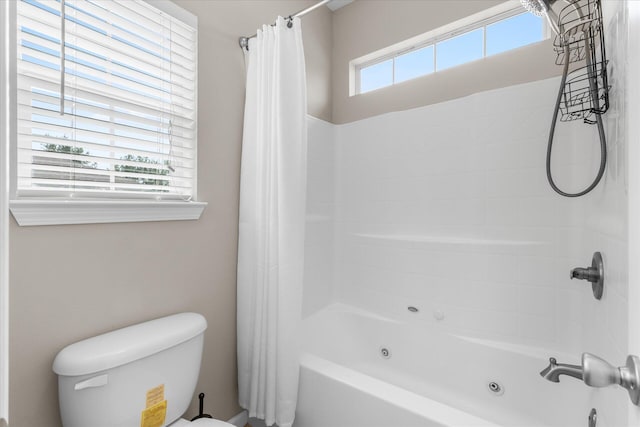 bathroom with toilet and shower / bathtub combination with curtain