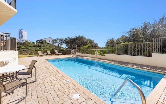 view of pool with a patio