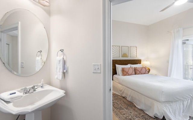 interior space featuring sink and ceiling fan