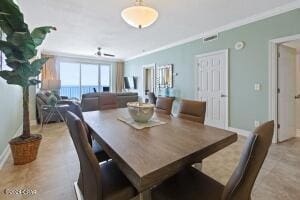 dining room with crown molding