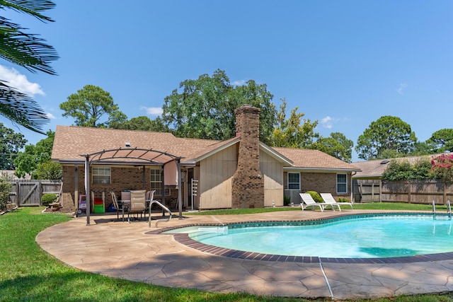 view of pool featuring a patio area