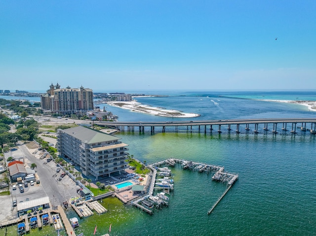 birds eye view of property with a view of city and a water view