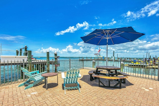 view of patio / terrace featuring a water view