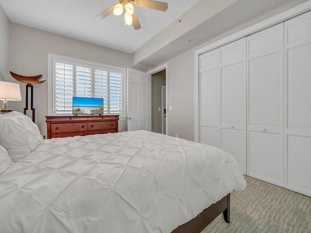 bedroom featuring a ceiling fan and a closet