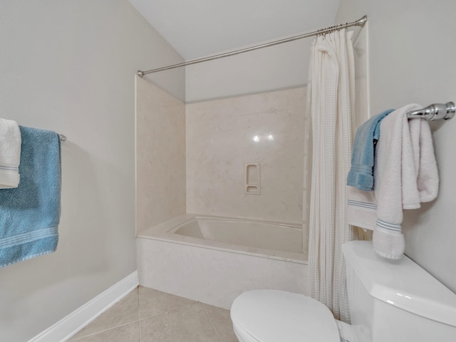 full bathroom featuring shower / tub combo, baseboards, toilet, and tile patterned floors