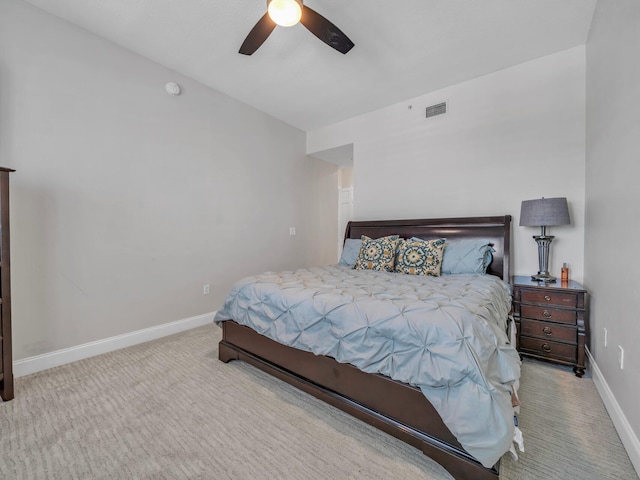 bedroom featuring carpet floors, visible vents, ceiling fan, and baseboards