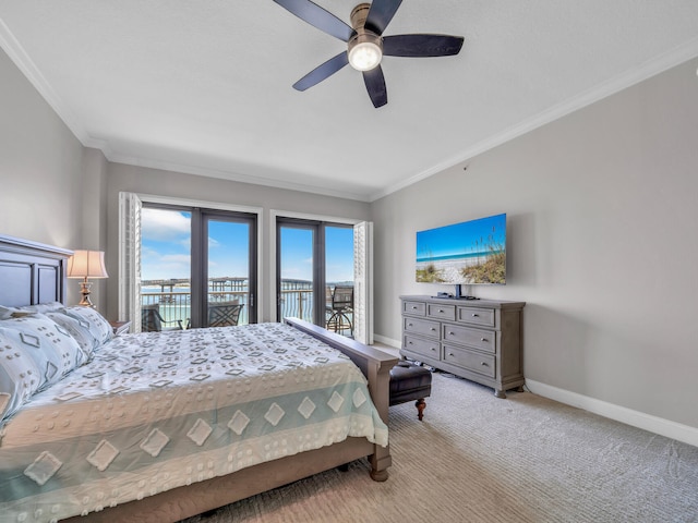 carpeted bedroom with baseboards, ornamental molding, a ceiling fan, and access to exterior