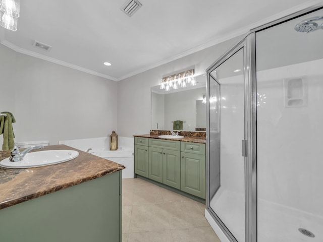 bathroom with a shower stall, visible vents, two vanities, and a sink