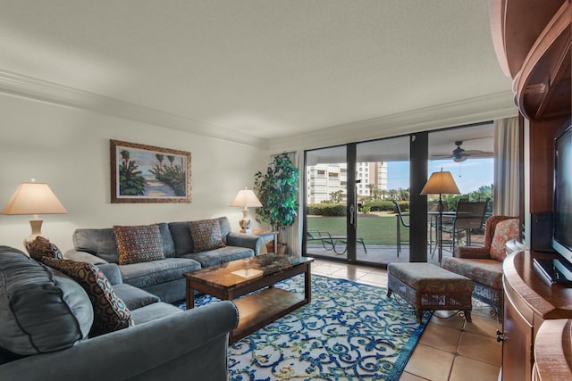 living area featuring light tile patterned floors and crown molding