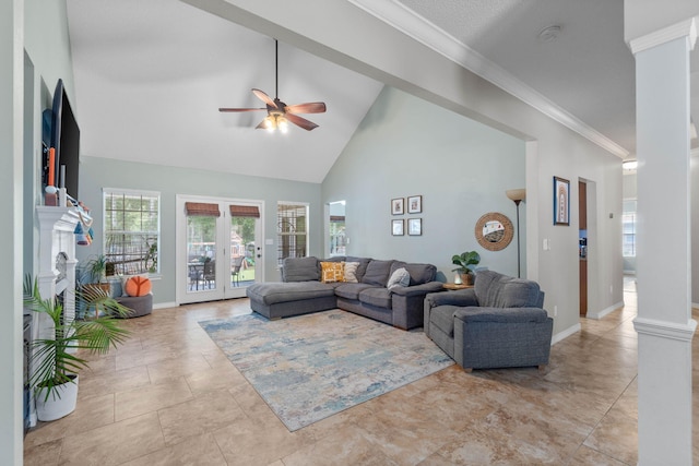 living room with high vaulted ceiling, ceiling fan, light tile patterned floors, and decorative columns