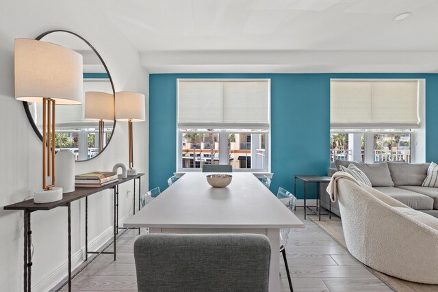 dining area featuring light wood-type flooring