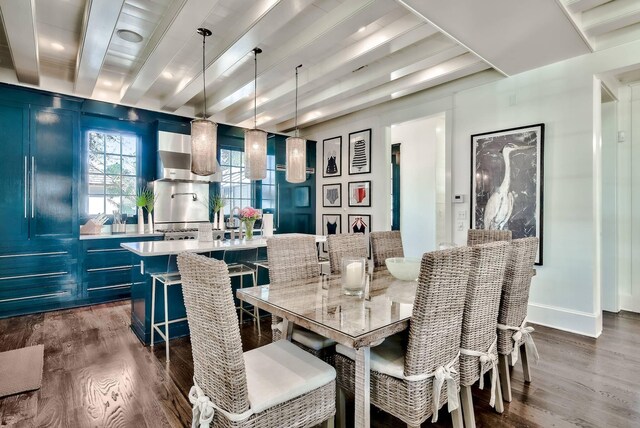 dining area featuring dark wood-type flooring and beam ceiling